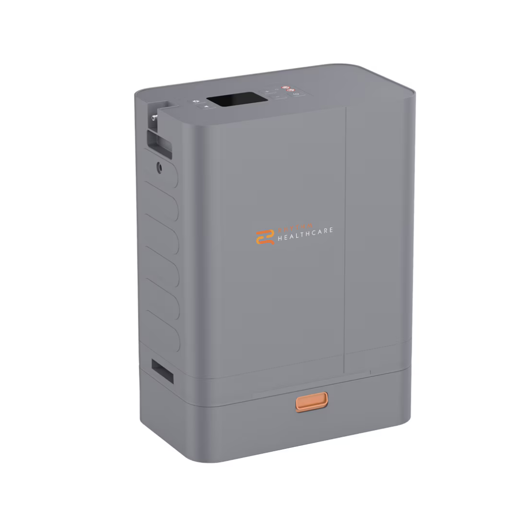 The Rhythm TOC3 Transportable Oxygen Concentrator is a portable gray device with a rectangular shape, digital display, top buttons, React Health logo, and orange accent—perfect for continuous flow and portable oxygen therapy.